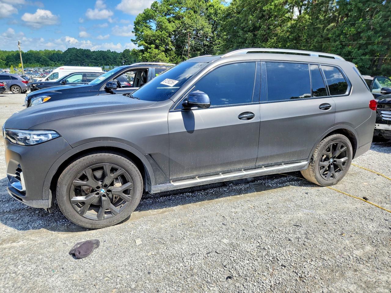 2019 BMW X7 xDrive50i, VIN 5UXCX4C53KLS39033 — Minor dents and scratches