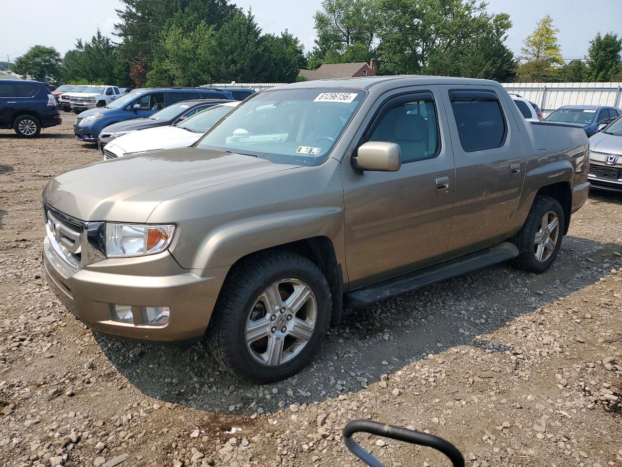 2011 Honda Ridgeline RTL, VIN 5FPYK1F57BB002474 — Front end