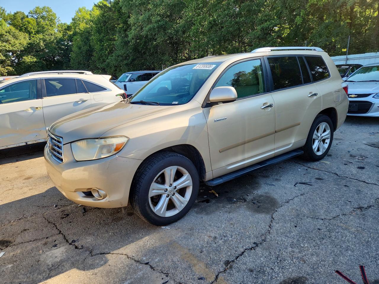 2010 Toyota Highlander Limited, VIN 5TDYK3EHXAS007985 — Side