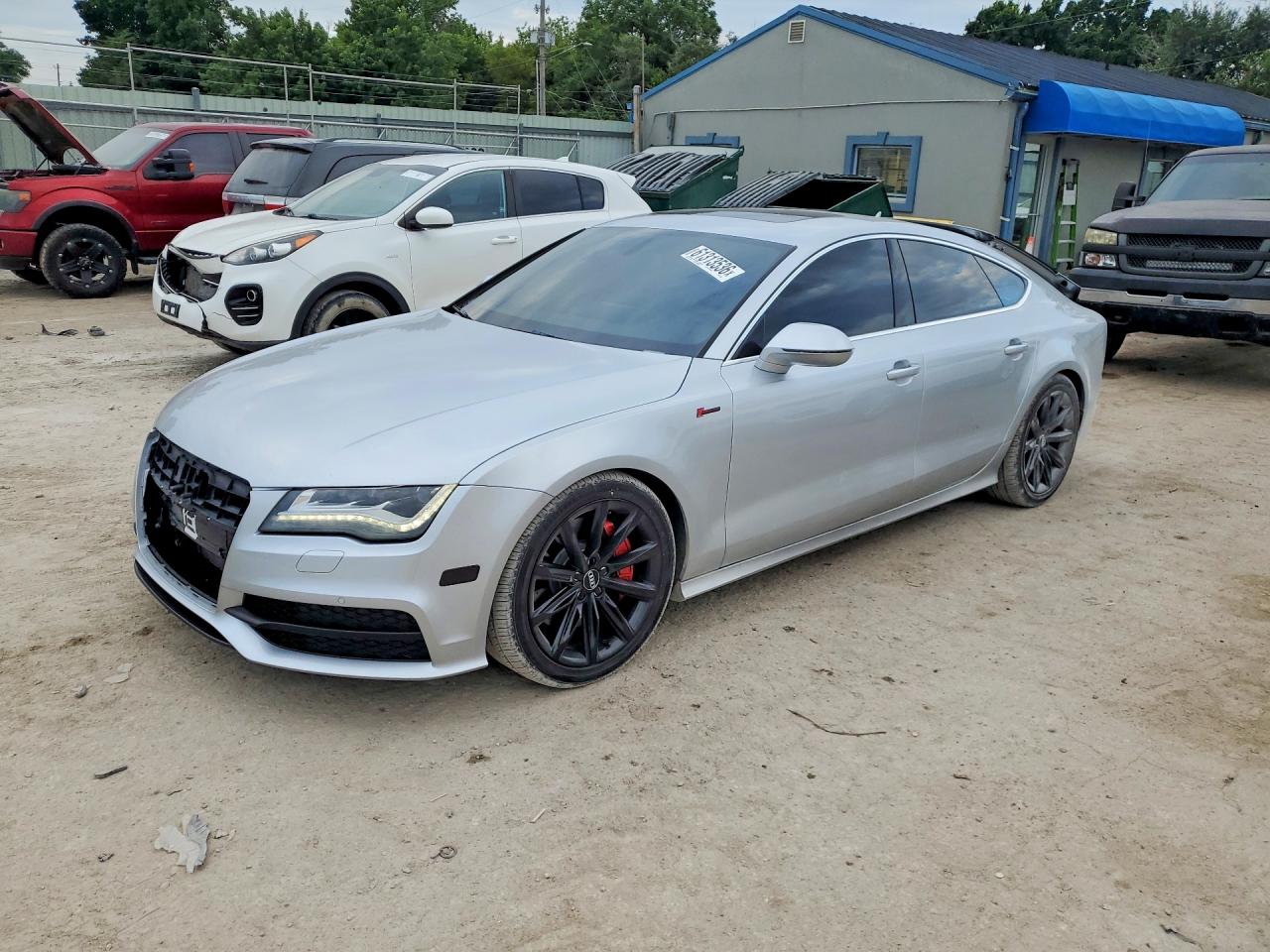 2012 Audi A7 Prestige, VIN WAU2GAFC3CN139796 — Rear end