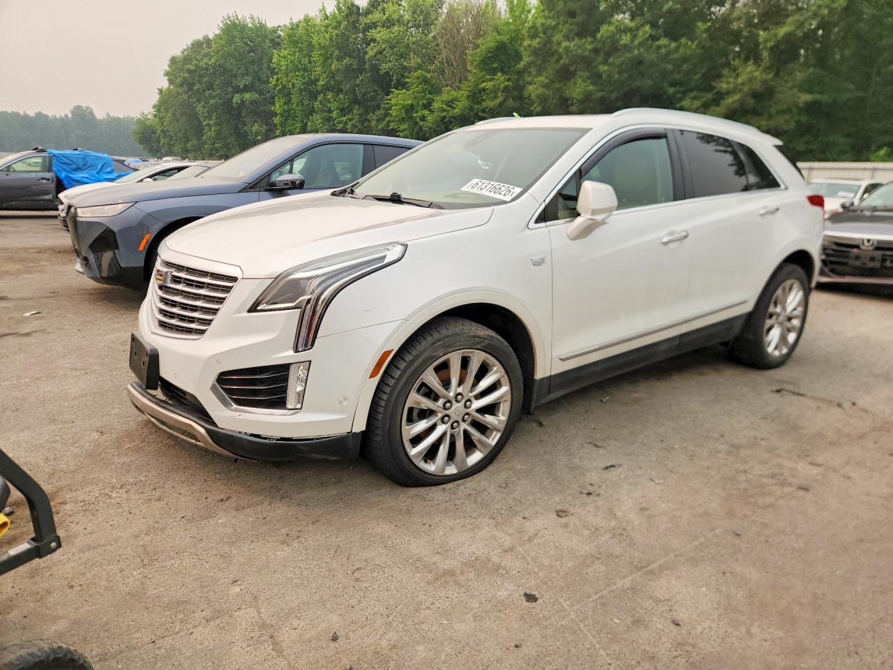 2017 Cadillac XT5 Platinum AWD, VIN 1GYKNFRS9HZ166178 — Water / flood