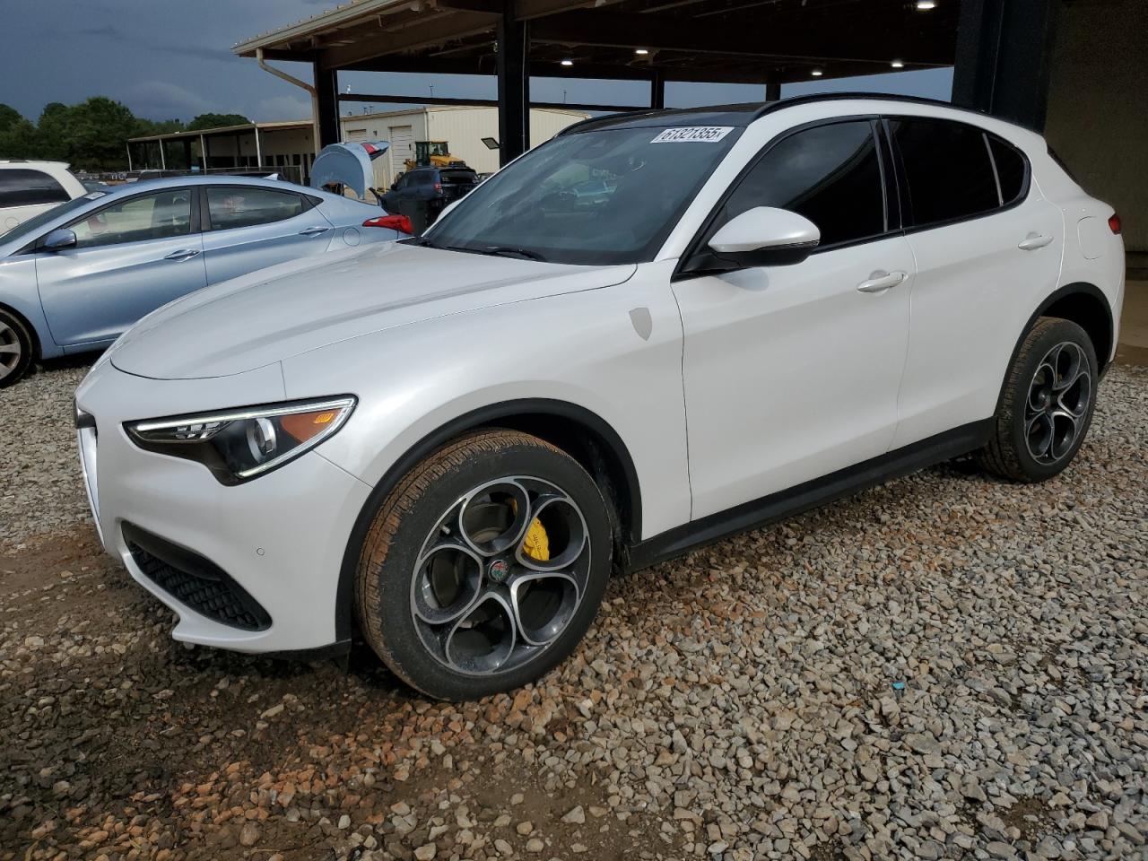 2019 Alfa Romeo Stelvio Ti Sport, VIN ZASPAKBN9K7C42755 — Hail