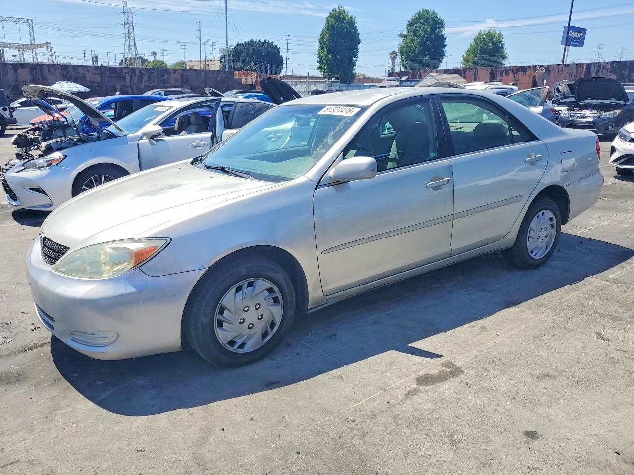2004 Toyota Camry LE, VIN 4T1BE32K34U290576 — Minor dents and scratches