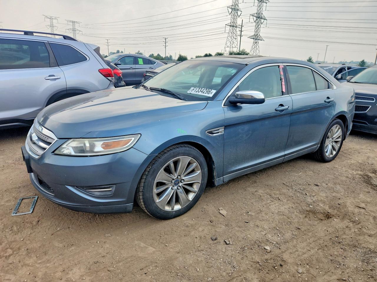 2010 Ford Taurus Limited, VIN 1FAHP2FW4AG145661 — Minor dents and scratches