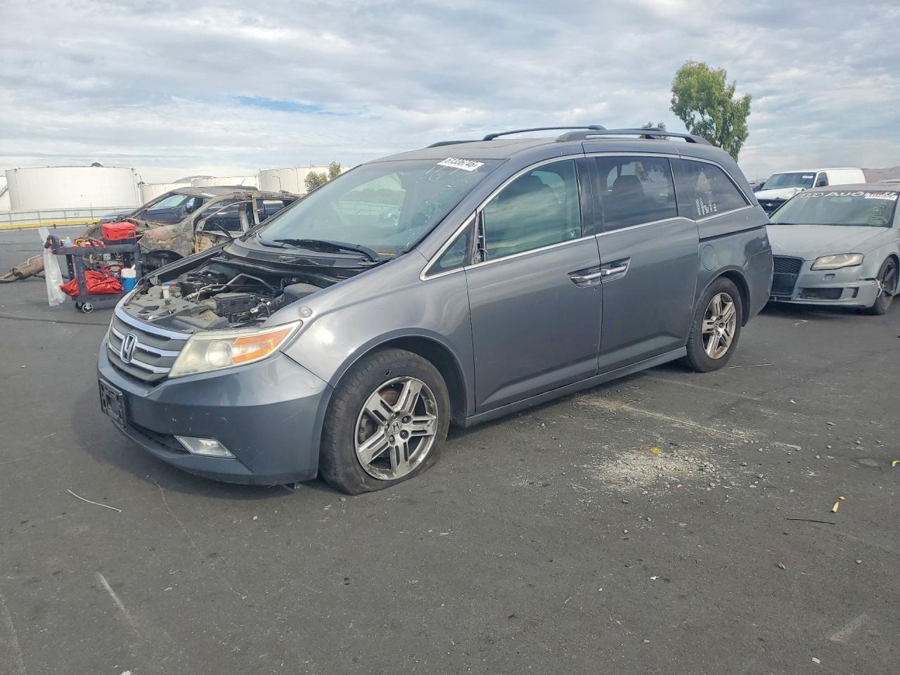 2012 Honda Odyssey Touring, VIN 5FNRL5H95CB021625 — Фото с аукциона