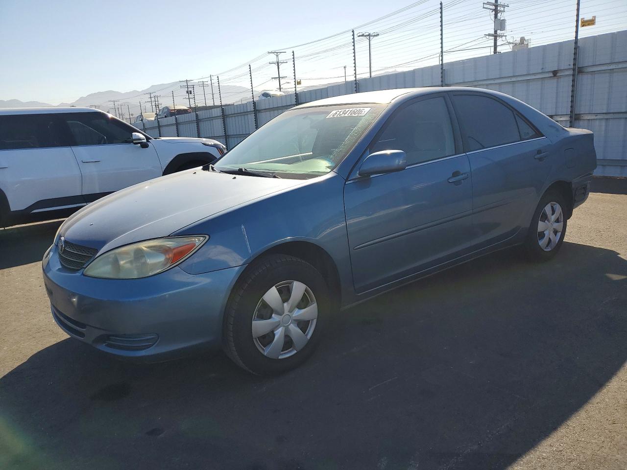 2004 Toyota Camry LE, VIN JTDBE32K440269151 — Rear end