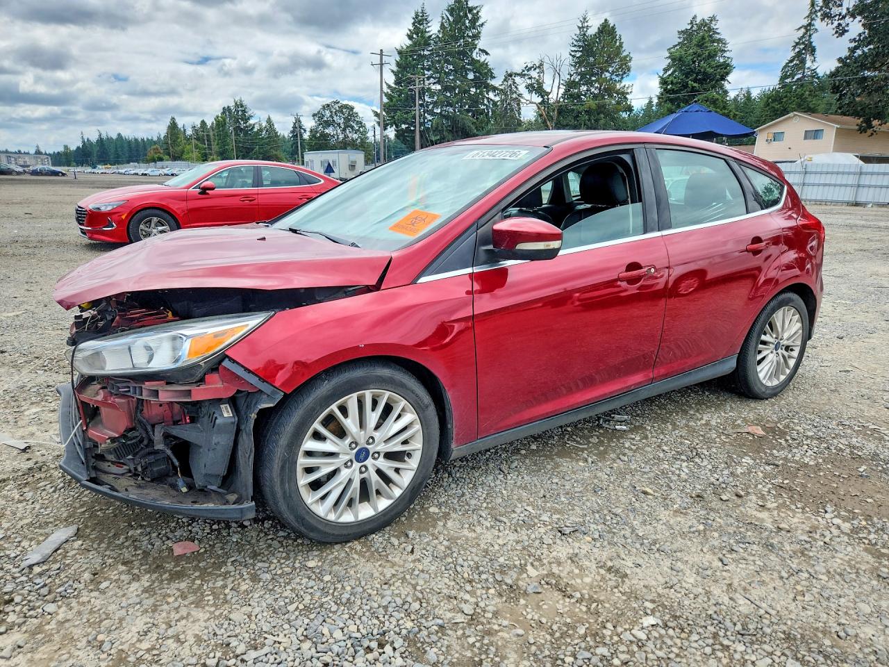 2015 Ford Focus Titanium, VIN 1FADP3N25FL358796 — Front end