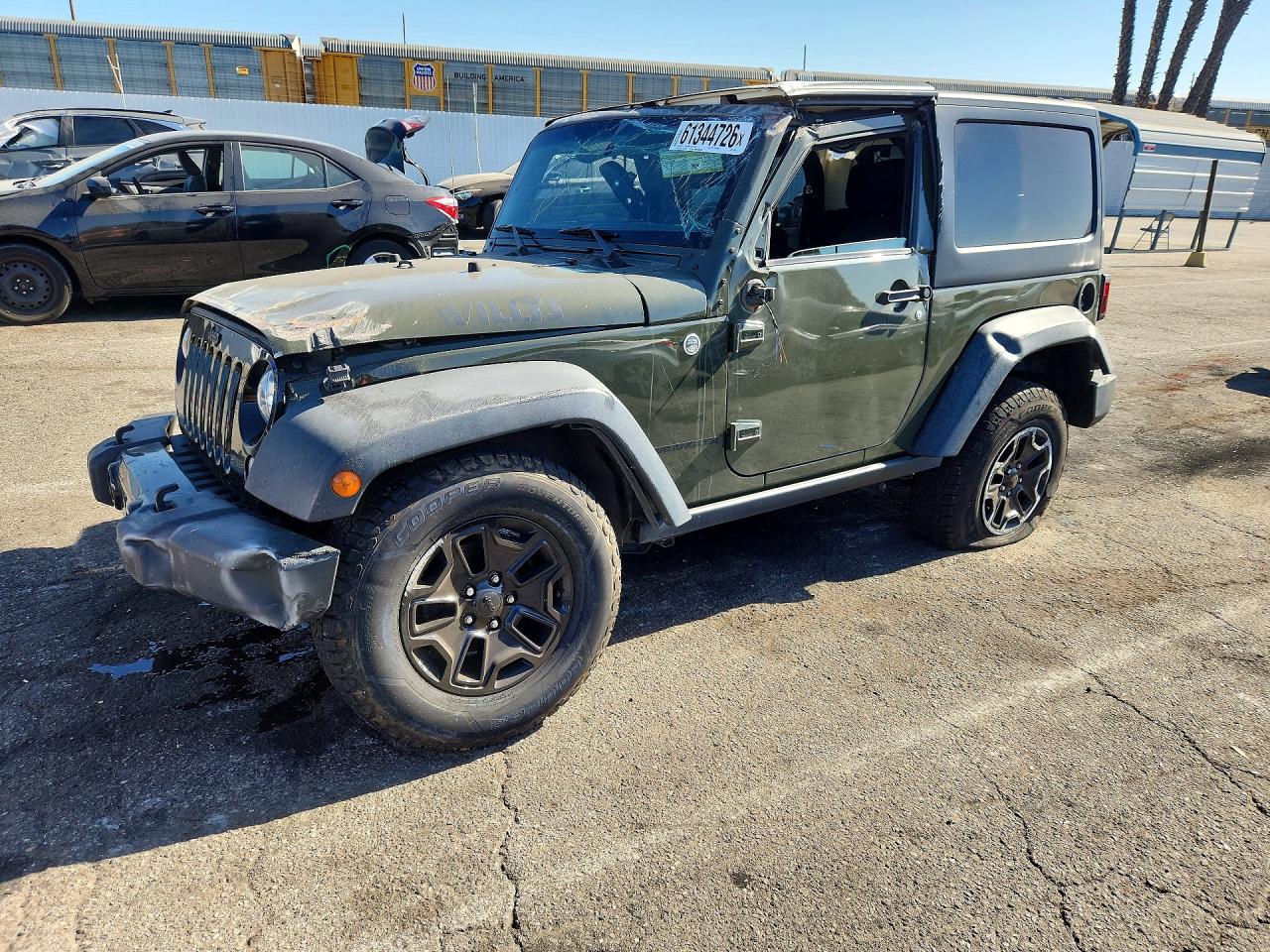 2015 Jeep Wrangler Freedom Edition, VIN 1C4AJWAG0FL724231 — Rollover