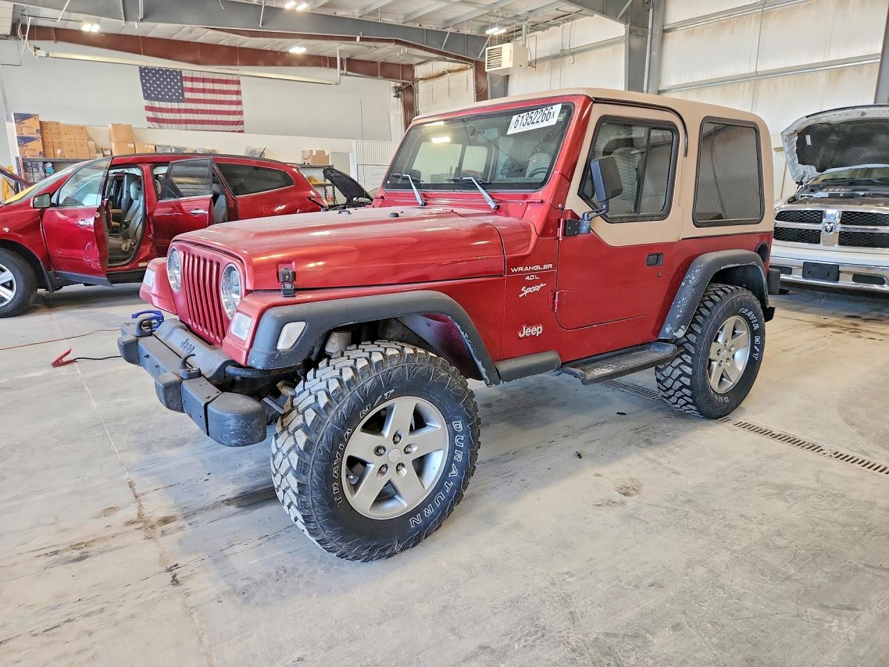 1999 Jeep Wrangler Sport, VIN 1J4FY19S1XP431293 — Град