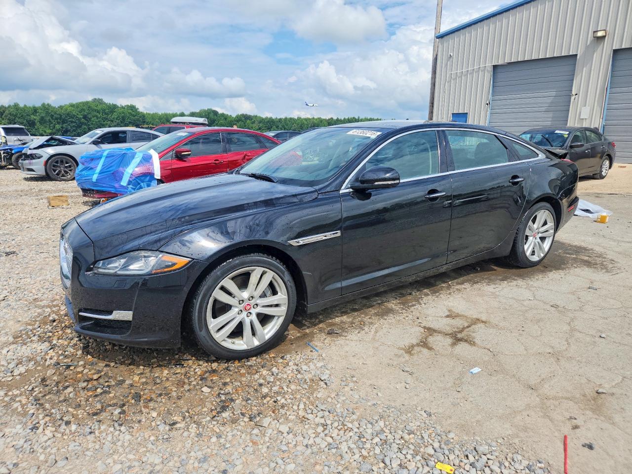 2016 Jaguar XJ Portfolio, VIN SAJWA2G78G8V99507 — Rear end