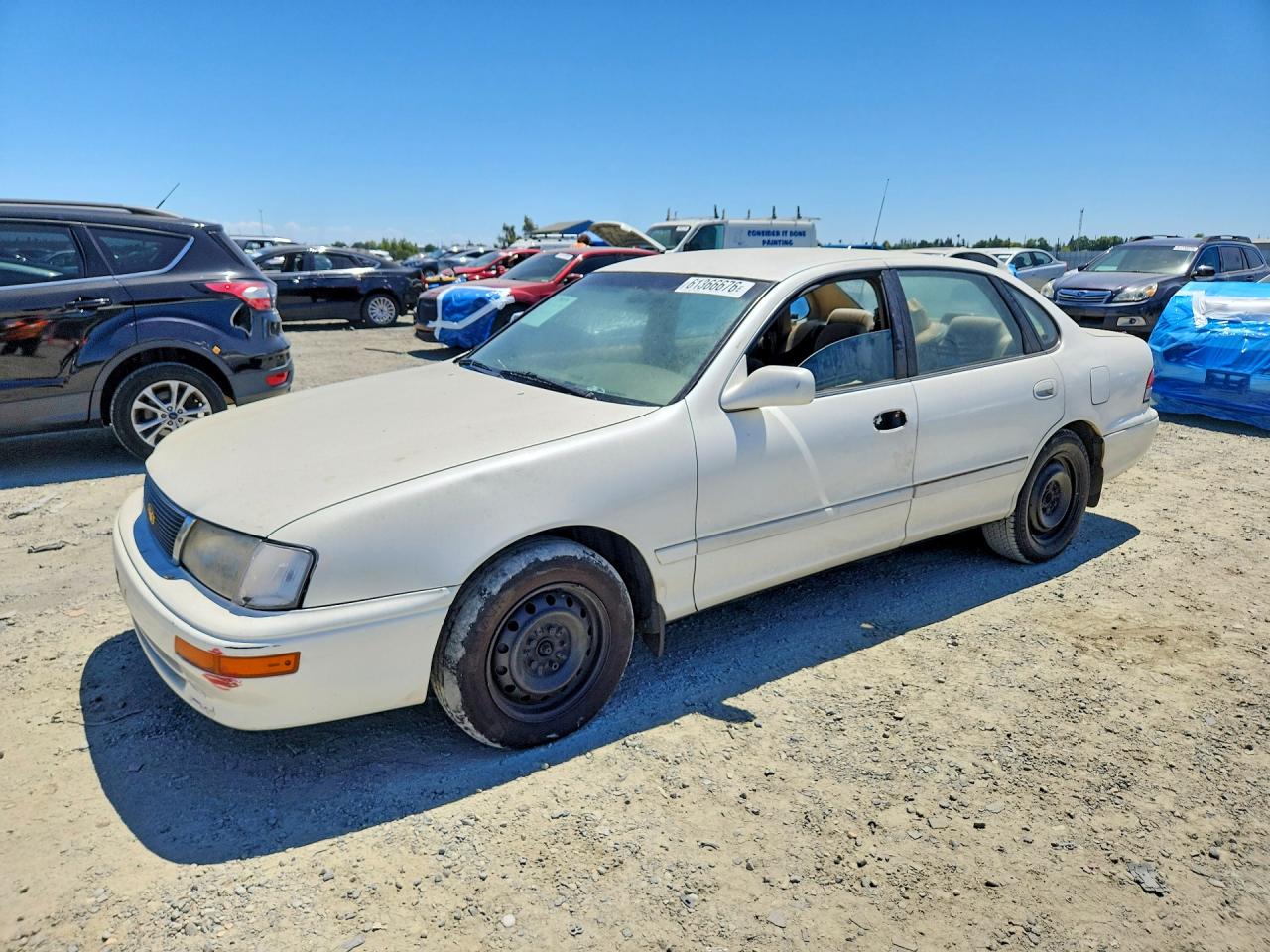 1996 Toyota Avalon XL, VIN 4T1BF12B9TU123624 — Side