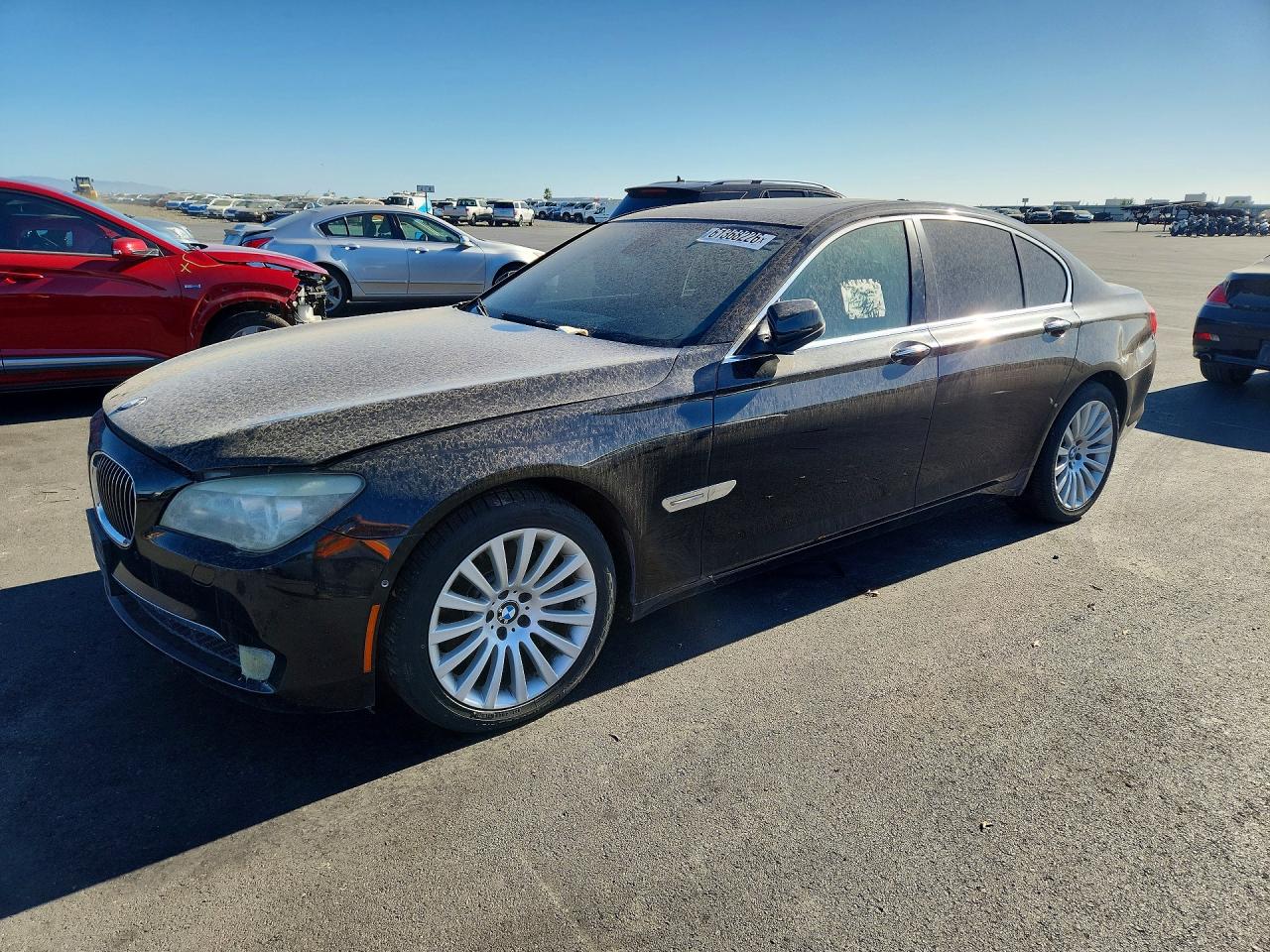 2012 BMW 7 Series 750i, VIN WBAKA8C50CCY37827 — Rear end
