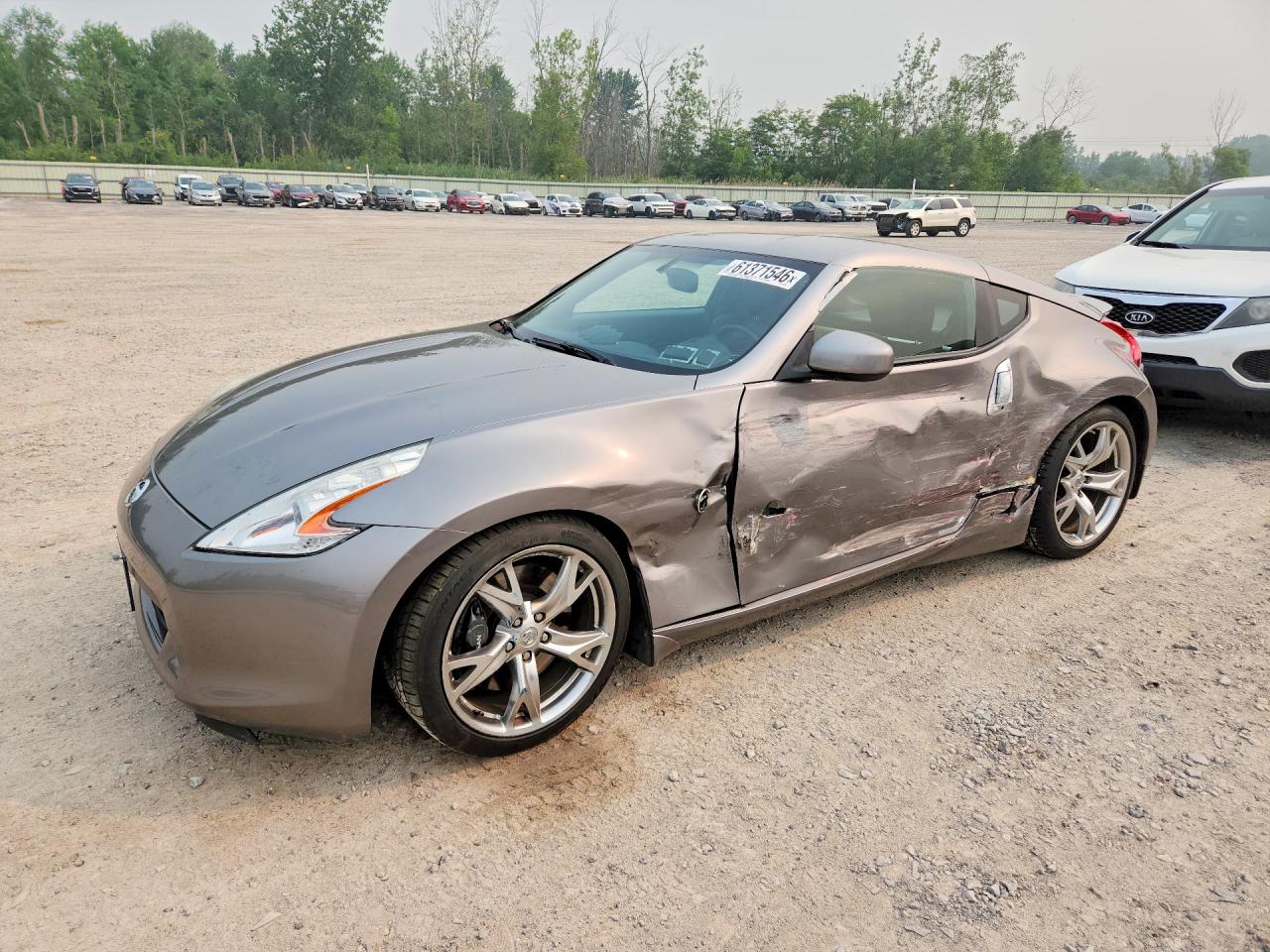 2009 Nissan 370Z Touring, VIN JN1AZ44E49M409330 — Side
