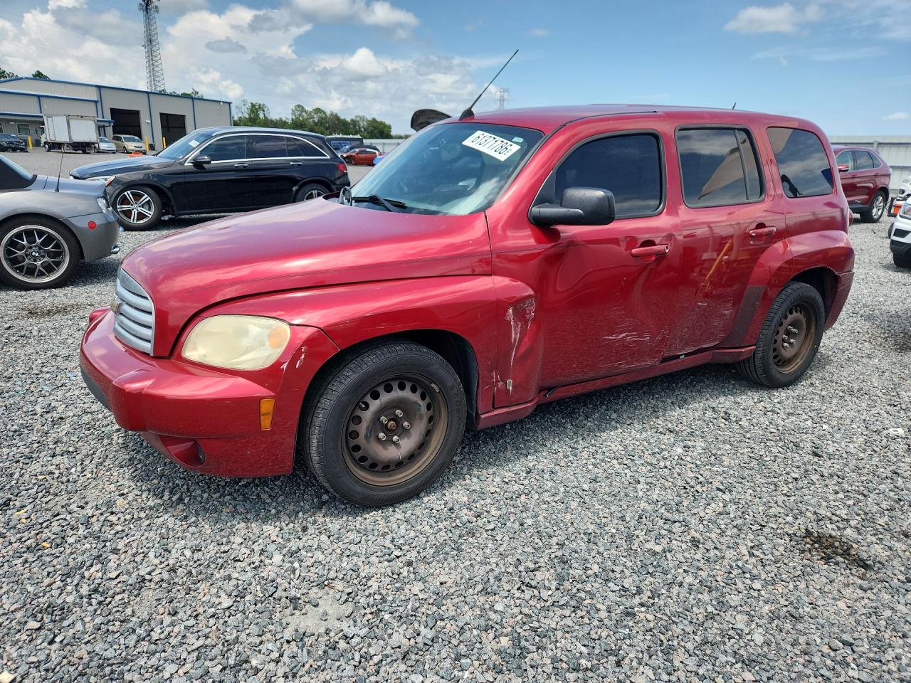 2011 Chevrolet HHR LS, VIN 3GNBAAFW2BS553209 — Side
