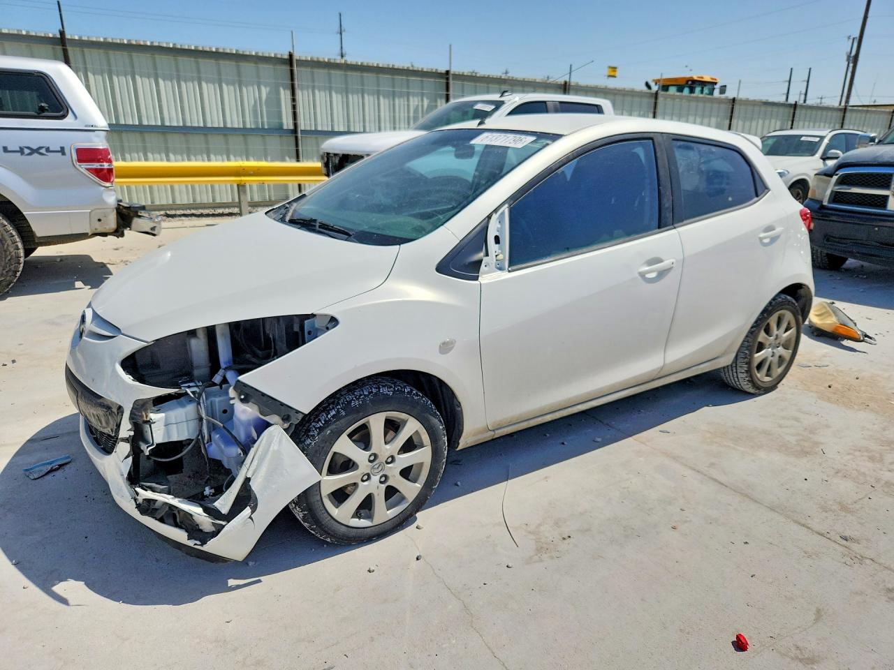 2012 Mazda 2 Touring, VIN JM1DE1LY7C0133336 — Front end