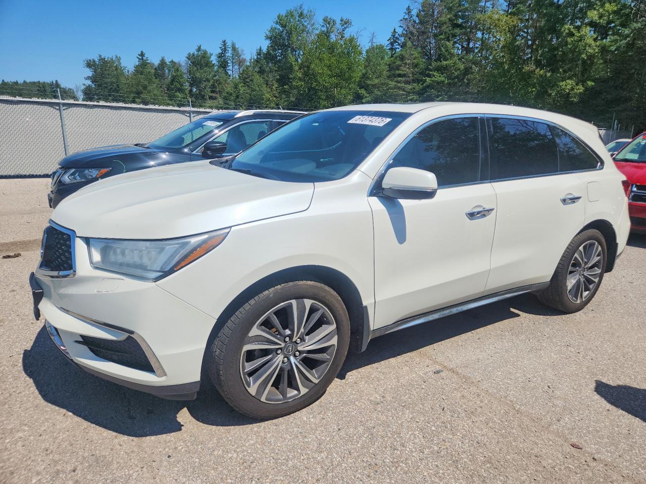 2019 Acura MDX Technology, VIN 5J8YD4H49KL801020 — Бок