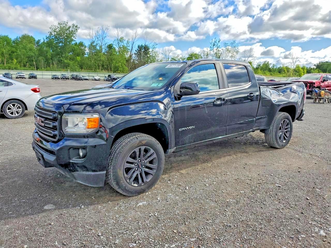 2019 GMC Canyon 4WD SLE, VIN 1GTG6CEN0K1308057 — Rear end