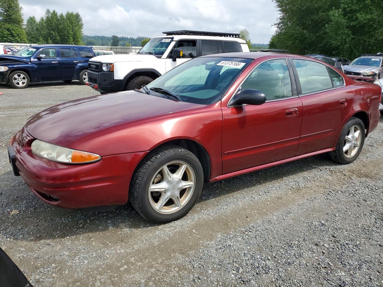 2003 Oldsmobile Alero GL1, VIN 1G3NL52E73C166991 — Бок