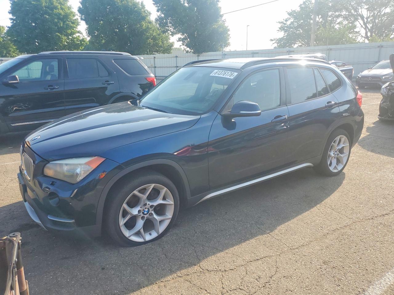 2013 BMW X1 xDrive28i, VIN WBAVL1C50DVR83665 — Front end