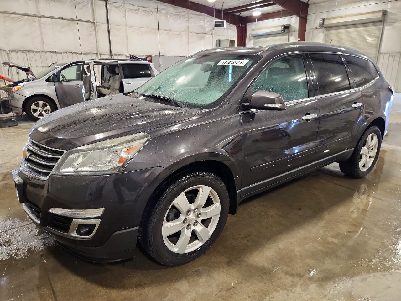 2016 Chevrolet Traverse LT, VIN 1GNKVGKDXGJ163303 — Hail
