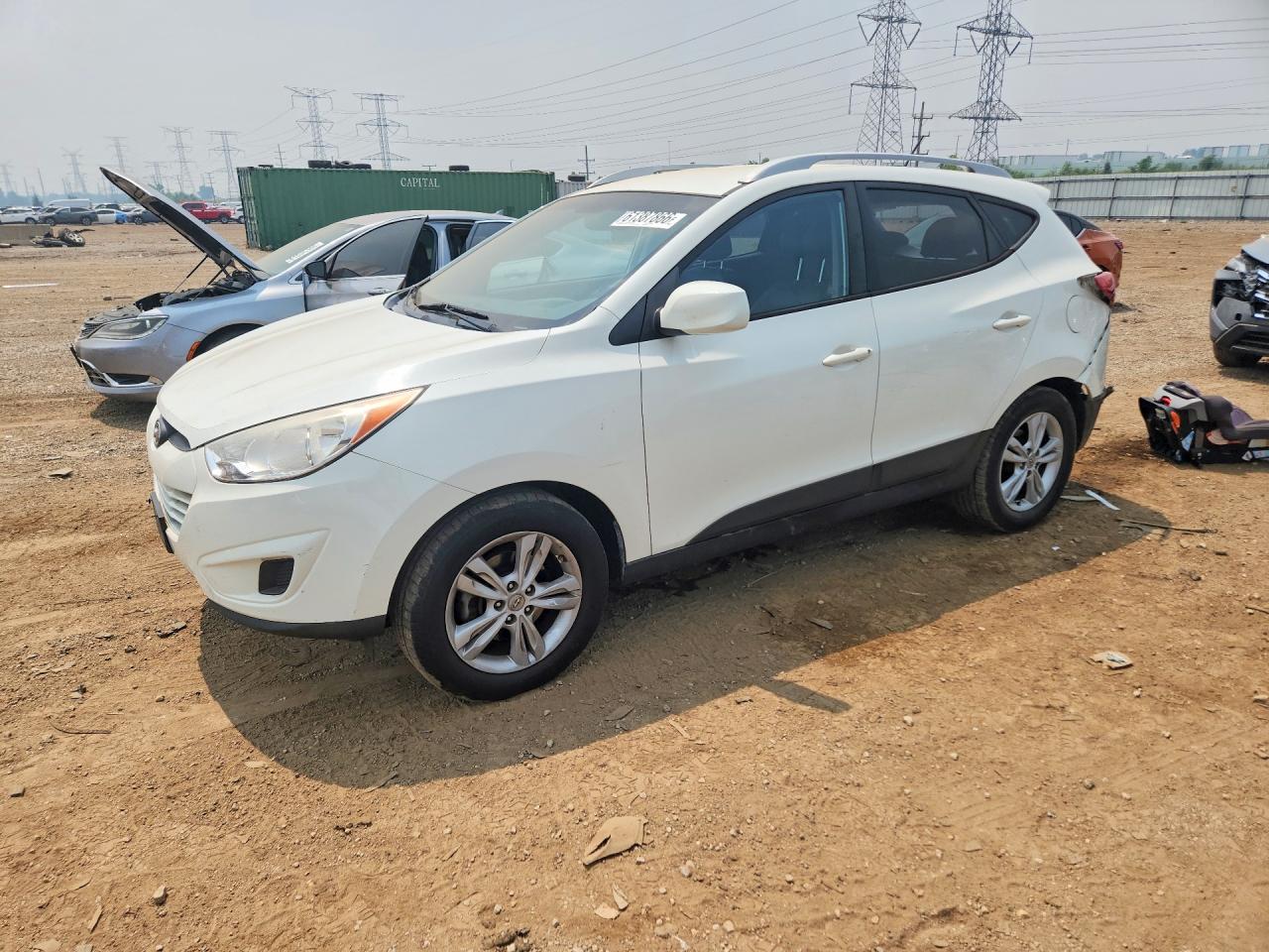 2011 Hyundai Tucson GLS, VIN KM8JUCAC0BU243804 — Rear end