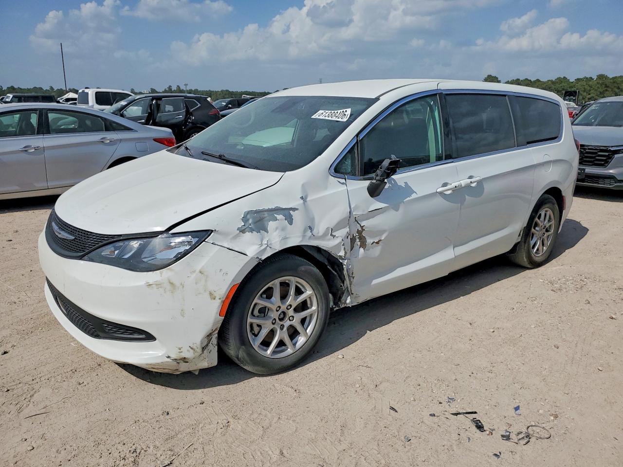 2023 Chrysler Voyager LX, VIN 2C4RC1CG4PR625594 — Side