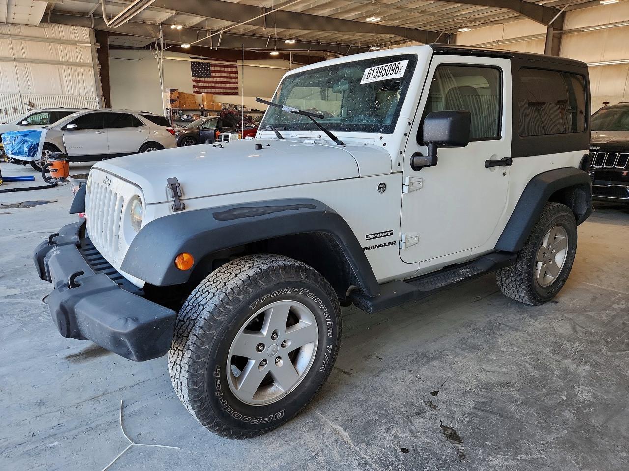 2012 Jeep Wrangler Sport, VIN 1C4GJWAG3CL259210 — Бок