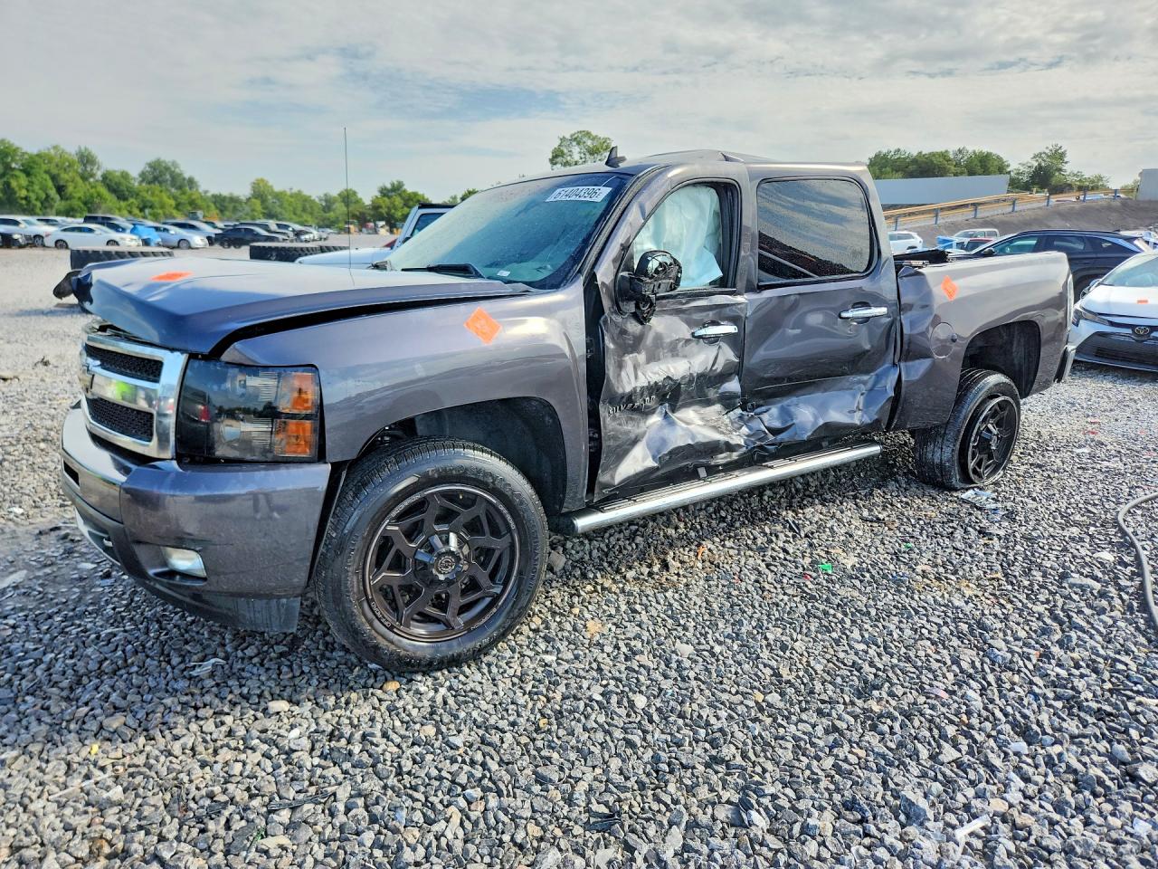 2011 Chevrolet Silverado 1500 LTZ, VIN 3GCPCTE09BG117106 — Side