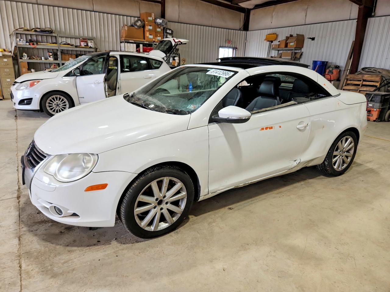 2009 Volkswagen Eos Komfort, VIN WVWBA71F79V018707 — Side