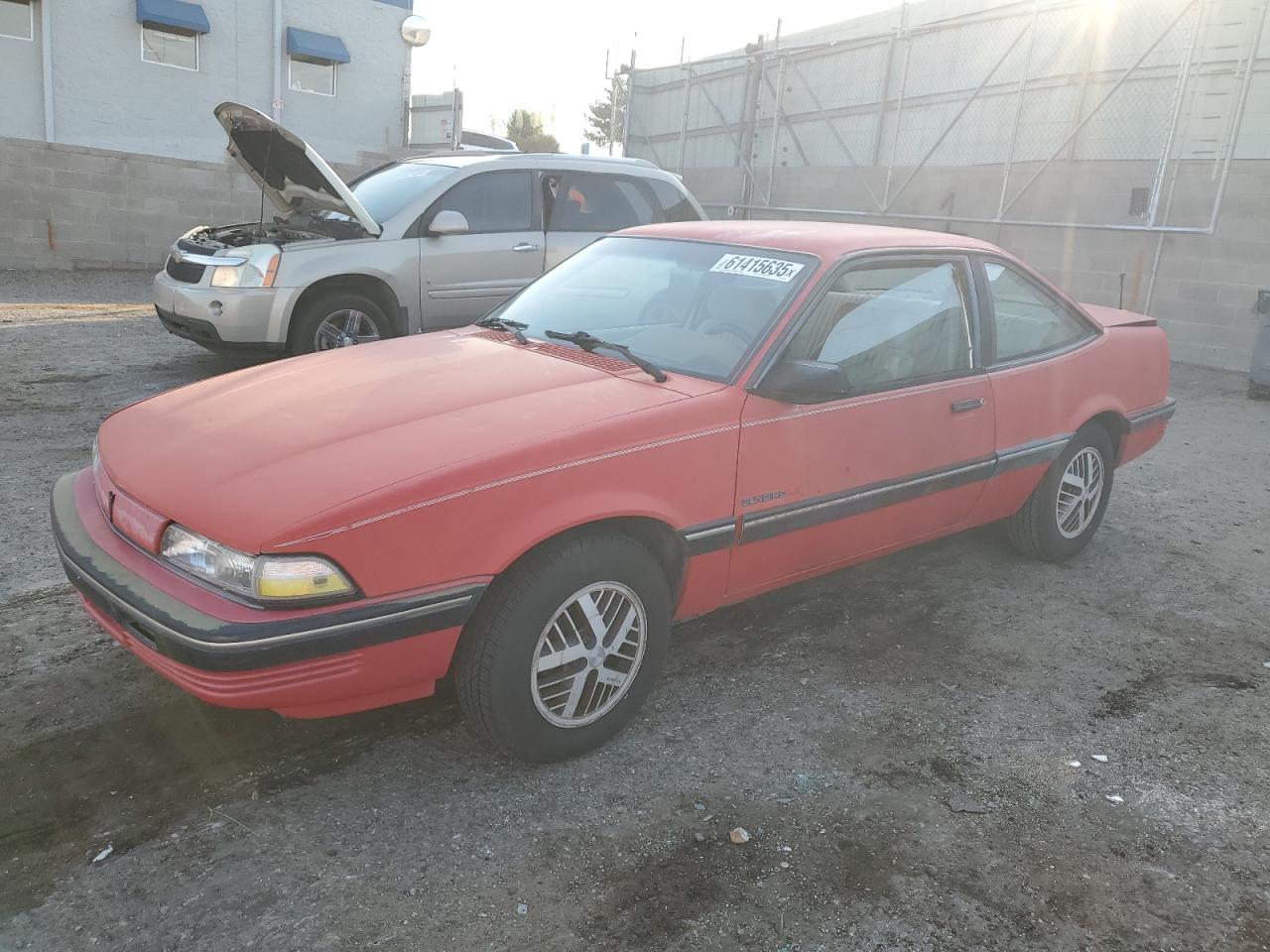1990 Pontiac Sunbird, VIN 1G2JB14K6L7546253 — Normal wear