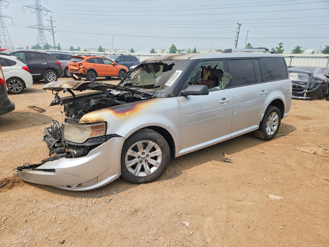 2010 Ford Flex SE, VIN 2FMGK5BC6ABA98976 — Burn