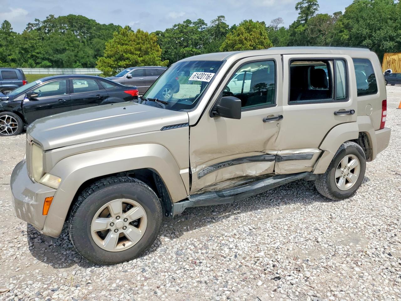 2011 Jeep Liberty Sport, VIN 1J4PP2GK7BW569693 — Side