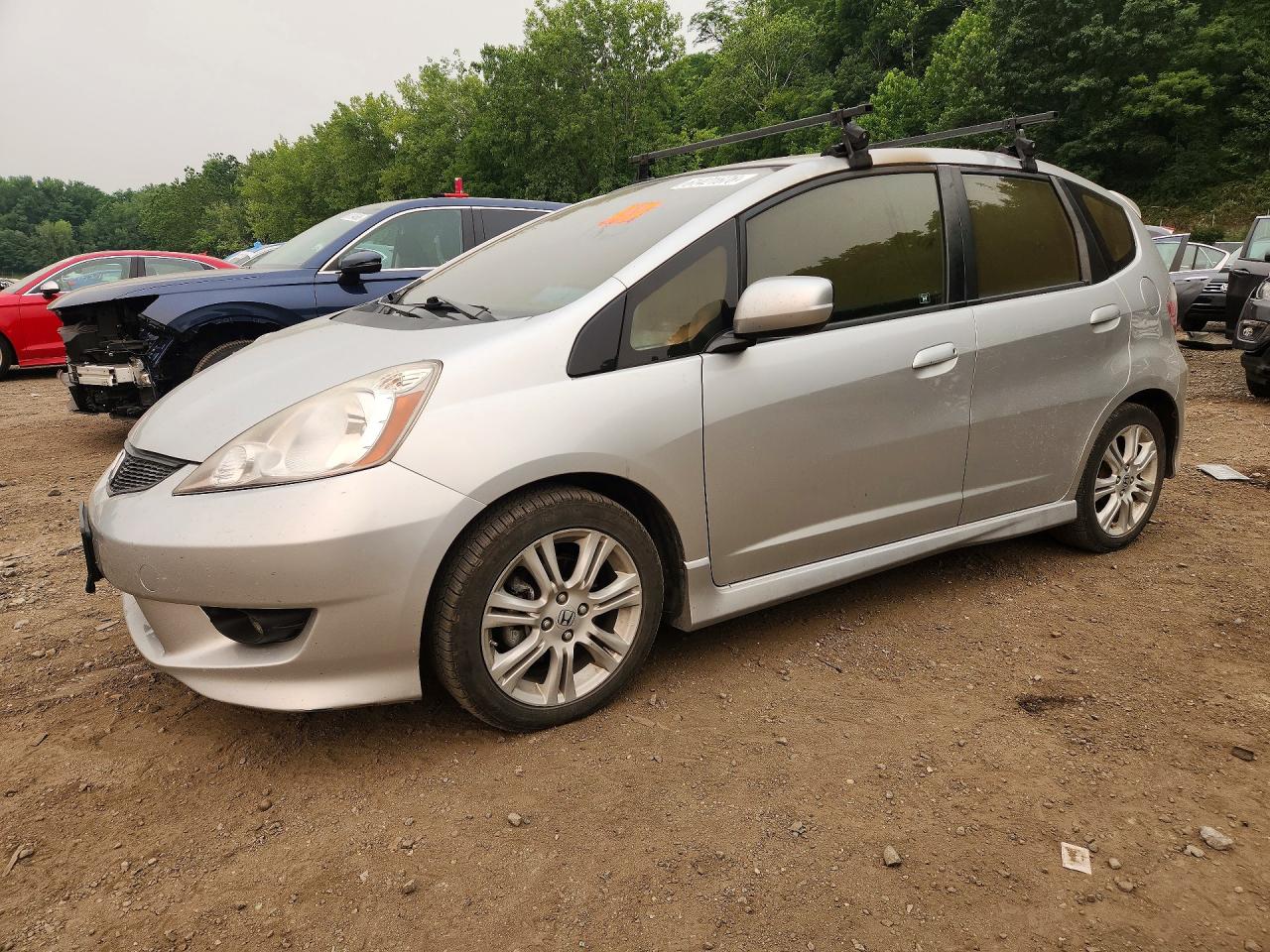 2011 Honda Fit Sport, VIN JHMGE8H56BC005914 — Interior fire