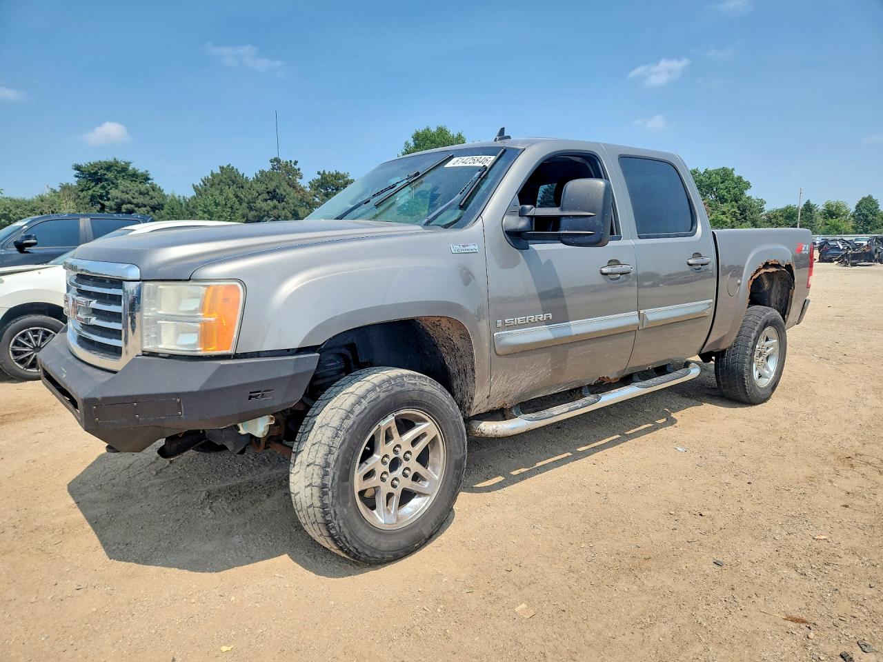 2009 GMC Sierra 1500 SLT, VIN 3GTEK33M09G206427 — Side