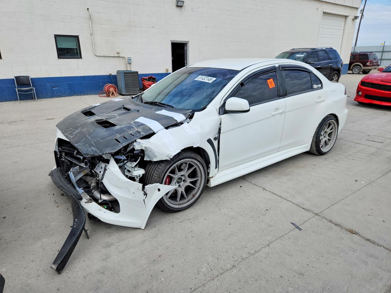 2014 Mitsubishi Lancer Evolution GSR, VIN JA32W8FV9EU023798 — Front end