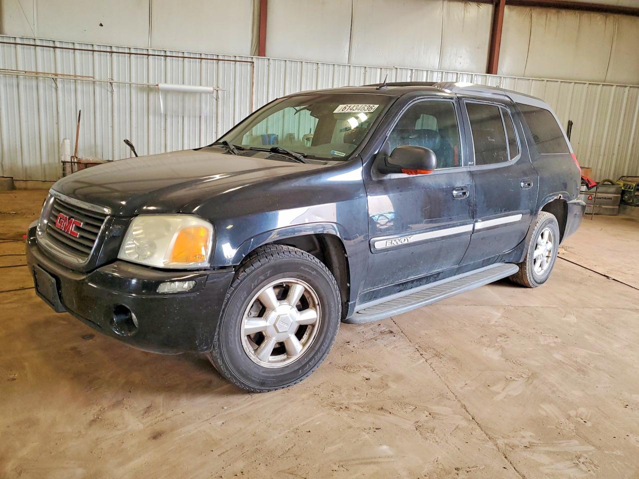 2004 GMC Envoy SLE, VIN 1GKET12S046180945 — Rear end