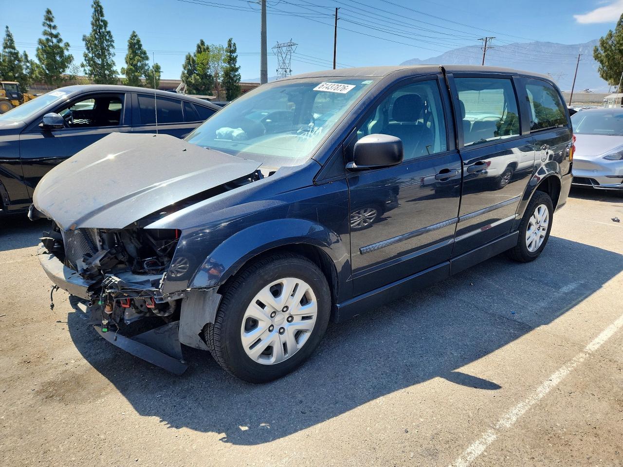 2014 Dodge Grand Caravan SE, VIN 2C4RDGBG4ER407296 — Front end