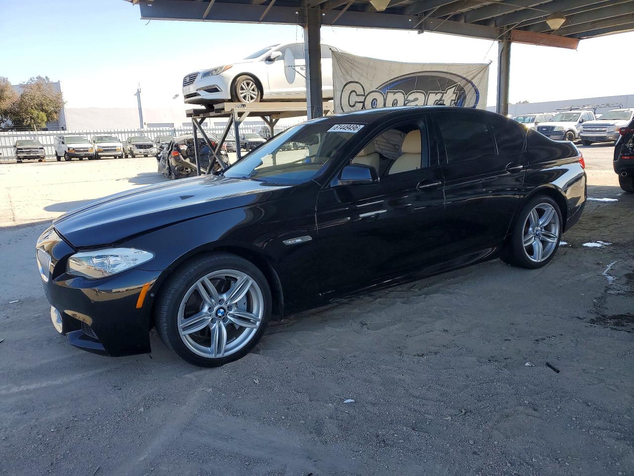 2012 BMW 5 Series 550i, VIN WBAFR9C52CDV58857 — Side