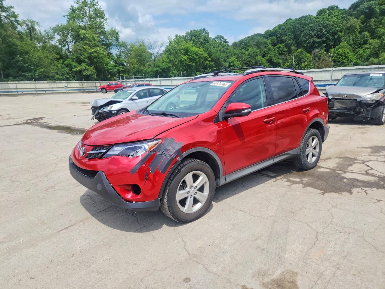 2013 Toyota RAV4 XLE, VIN 2T3RFREV3DW102117 — Side