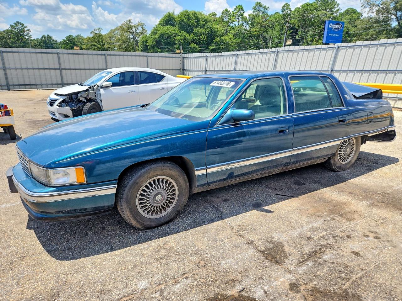 1995 Cadillac DeVille, VIN 1G6KD52B1SU279384 — Зад