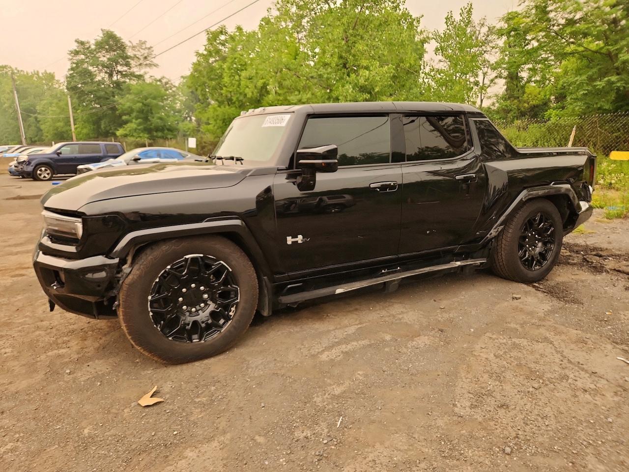 2025 GMC HUMMER EV Pickup 2X, VIN 1GT40BDD9SU118294 — Rear end