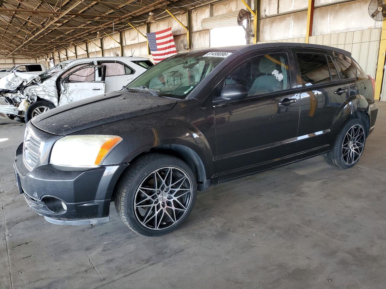2011 Dodge Caliber Mainstreet, VIN 1B3CB3HA6BD110859 — Normal wear
