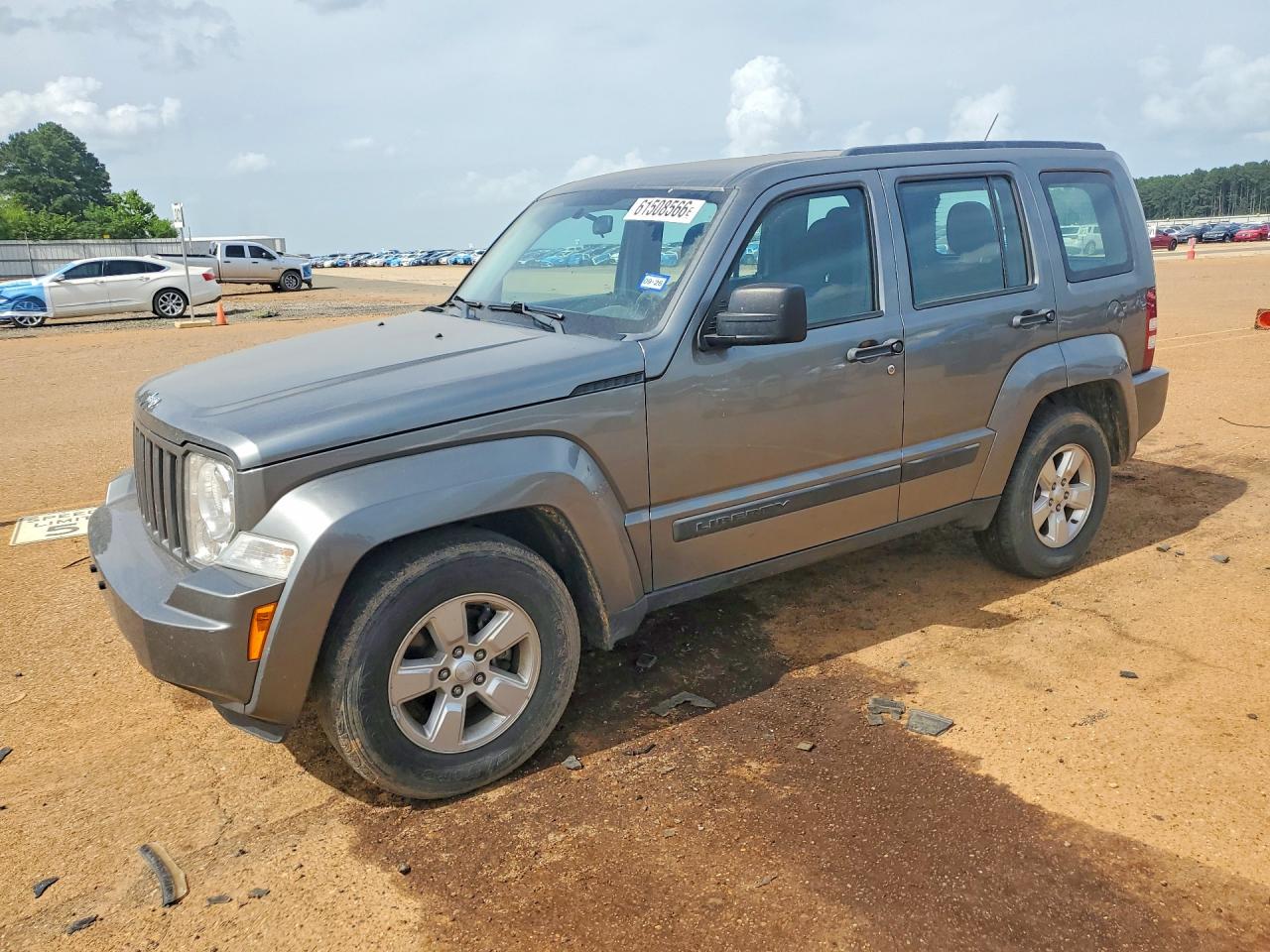 2012 Jeep Liberty Sport, VIN 1C4PJLAK0CW213383 — Бок