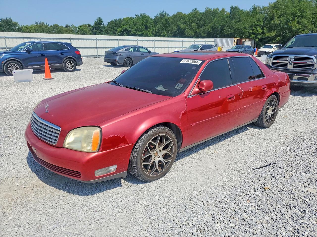 2004 Cadillac DeVille, VIN 1G6KD54Y74U164681 — Water / flood