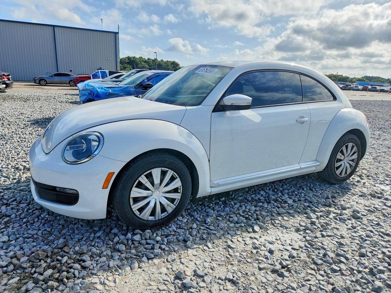 2012 Volkswagen Beetle 2.5L, VIN 3VWJX7AT1CM648639 — Minor dents and scratches