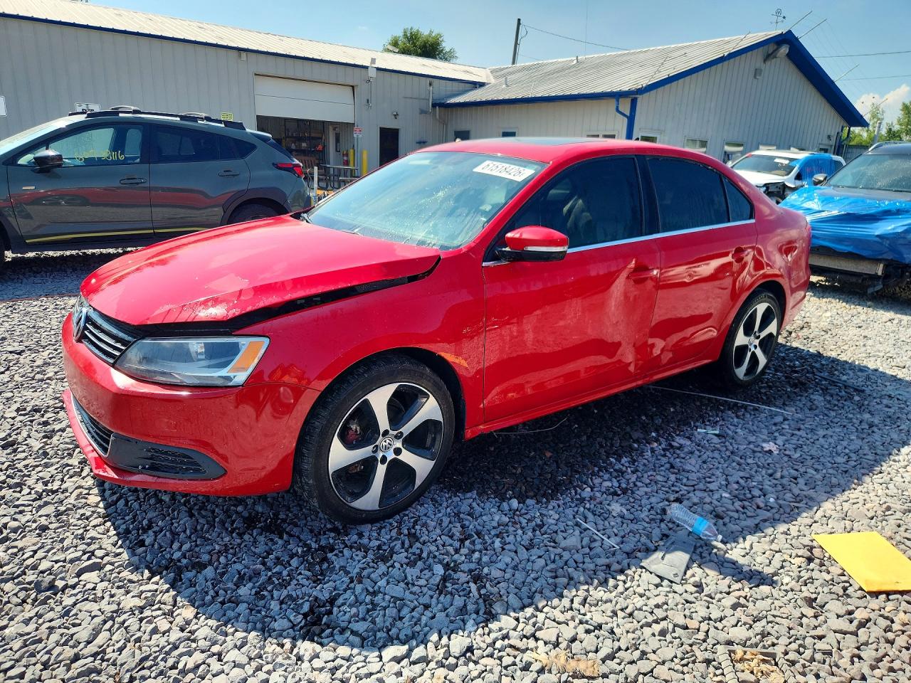2013 Volkswagen Jetta TDI w/Premium/Nav, VIN 3VWLL7AJ4DM385566 — Side