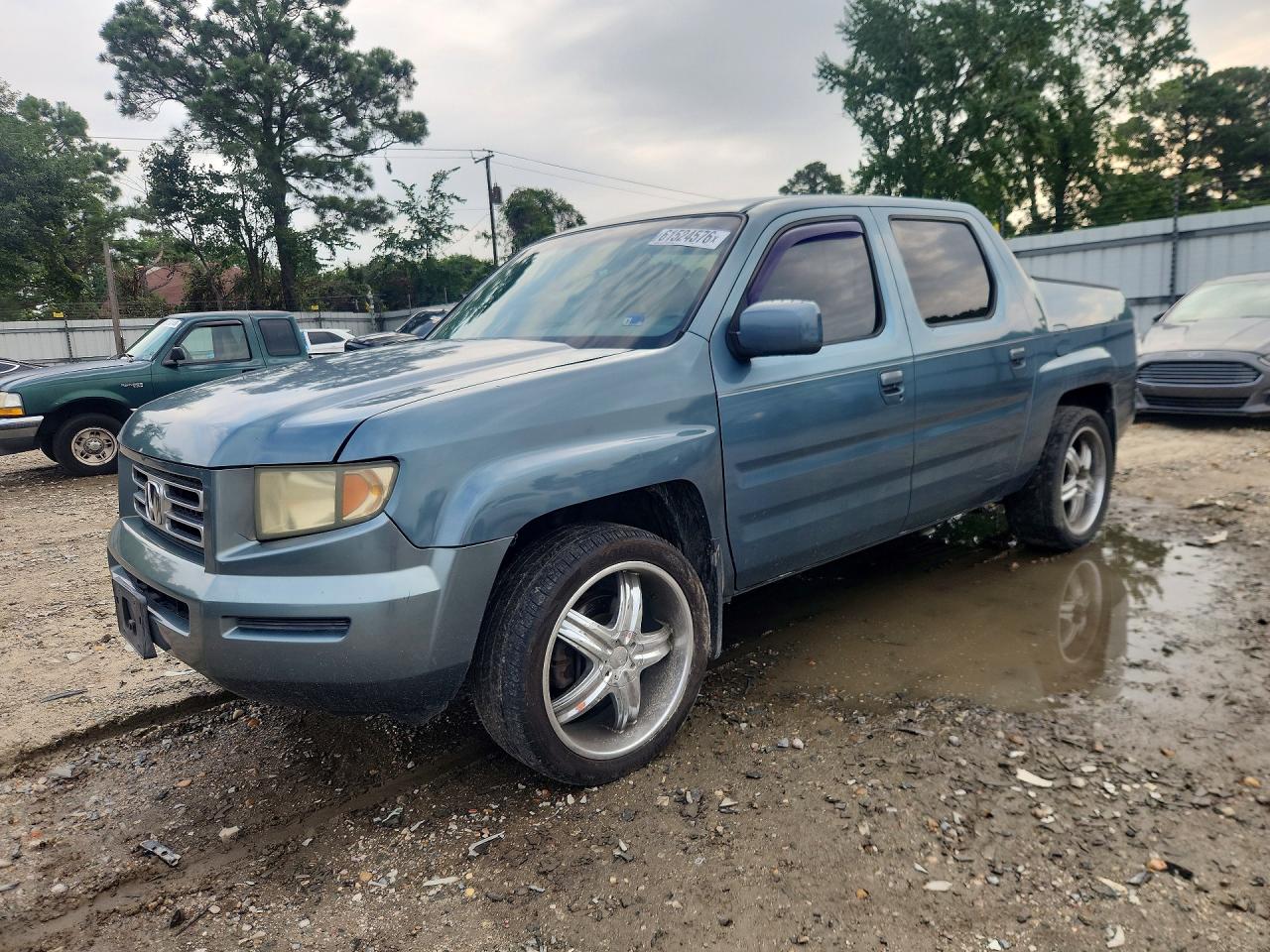 2006 Honda Ridgeline RTL, VIN 2HJYK16586H545501 — Burn