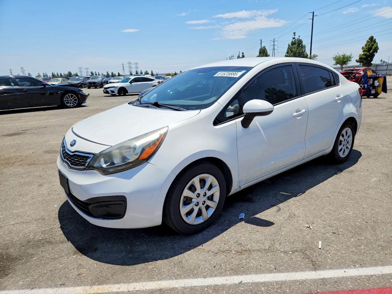 2013 Kia Rio LX, VIN KNADM4A3XD6245975 — Side