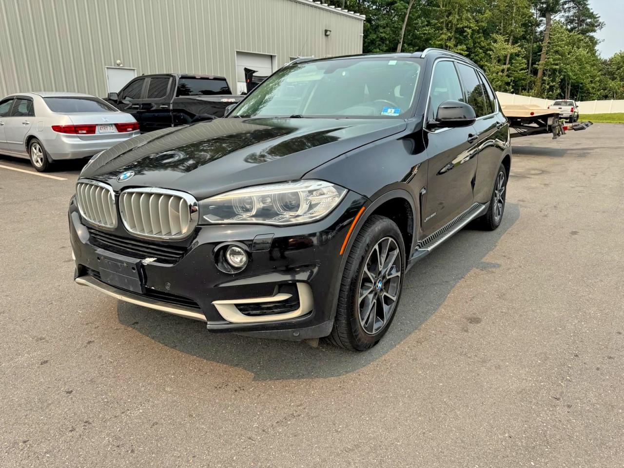 2015 BMW X5 xDrive50i, VIN 5UXKR6C50F0J77597 — Minor dents and scratches