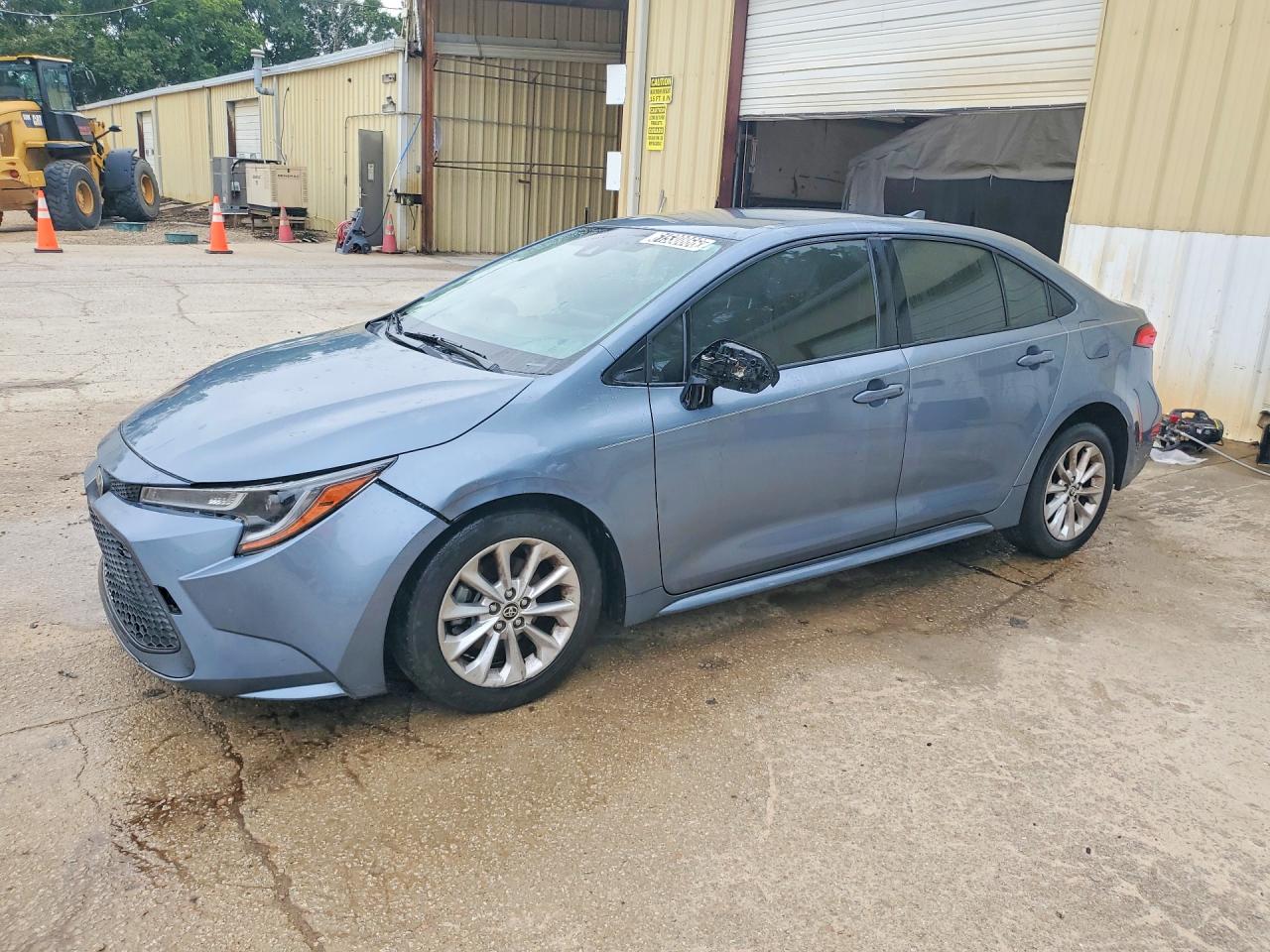 2021 Toyota Corolla LE, VIN JTDVPMAE1MJ177692 — Side